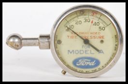 A early 20th Century pre war tyre pressure gauge f