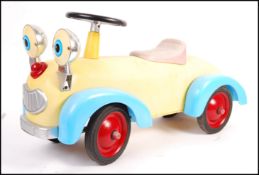 UNUSUAL CHILDS PUSH ALONG RIDE ON CAR TOY