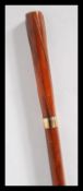 A 20th Century walking stick cane of tapering form