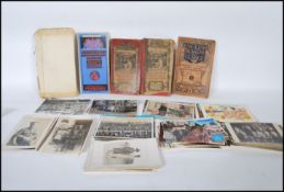 A collection of vintage postcards to include topog