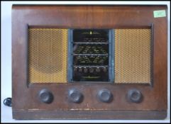 A vintage 20th Century walnut cased valve radio by