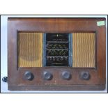 A vintage 20th Century walnut cased valve radio by