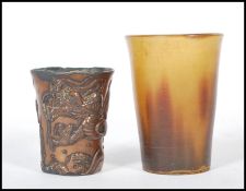 A Chinese cast bronze cup of small proportions hav