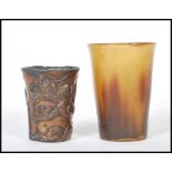 A Chinese cast bronze cup of small proportions hav