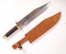 LATE 20TH CENTURY TRADITIONAL BOWIE KNIFE AND SCABBARD