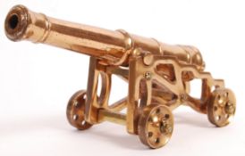 EARLY 20TH CENTURY CAST BRASS DESK TOP CANNON