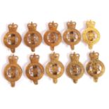 SET OF TEN HER MAJESTY'S PRISON BRASS CAP BADGES