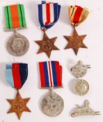 WW2 SECOND WORLD WAR MEDAL GROUP WITH CAP BADGES.