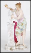 A 20th Century German Sitzendorf / Meissen style porcelain figurine of a female figure wearing