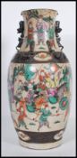 A 19th Century Chinese large base having a crackle glaze ground with hand painted famille verte