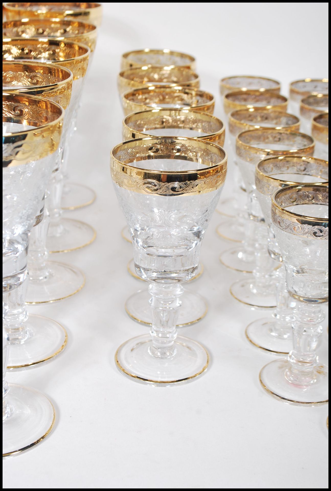 A large collection of glassware having scrolled decoration to the bowls raised on knopped columns on - Bild 6 aus 7