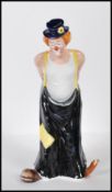 A Royal Doulton Circus clown figurine titled  'Tip-Toe' HN3293 modelled by Adrian Hughes, marks to