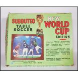 A vintage 20th Century boxed Subbuteo table soccer New World Cup Edition to include International