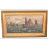 A early 20th Century oil on canvas of a seascape having Dutch sailing boats with figures in a rowing