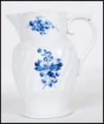 A 18th Century Georgian Worcester jug having ribbed central panel to the sides and a scrolled