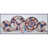A collection of 20th Century Japanese Imari ceramics to include two wall charger plates having