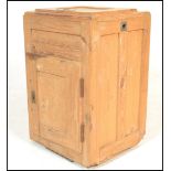 An early 20th Century 1920's icebox meat refrigerator of pine panel construction having hinged lid