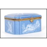 An early 20th Century continental German porcelain blue ceramic casket / trinket box with a pat