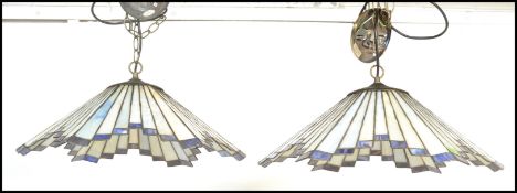 A matching pair of vintage 20th Century Tiffany style leaded glass hanging ceiling light shades in