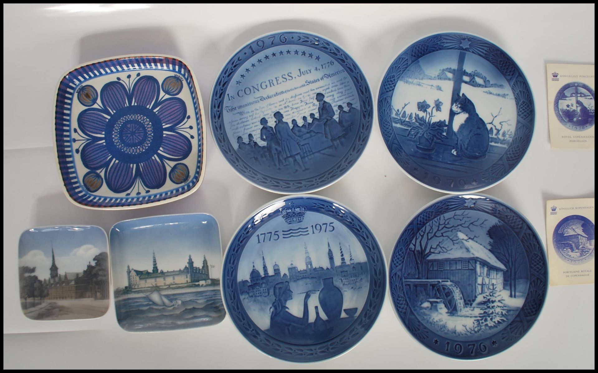 A group of four Royal Copenhagen blue and white porcelain plates to include a Bicentenary 1775-1975,