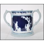 Golfing Interest- A early 20th Century Copeland Late Spode loving cup having a dark blue cobalt