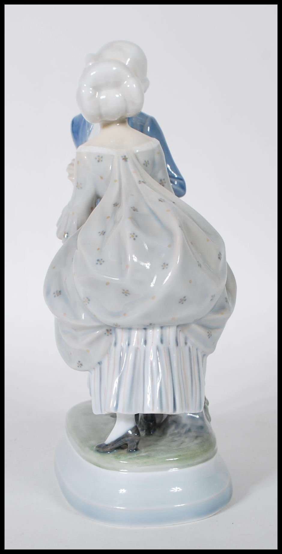 A Royal Copenhagen porcelain figurine depicting a Georgian couple kissing on a plinth base. Marks to - Image 4 of 6