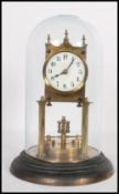 An antique late 19th / early 20th century brass and enamel anniversary clock. With pendulum. Mounted