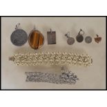 A small collection of vintage costume jewellery and silver jewellery items dating from the 19th