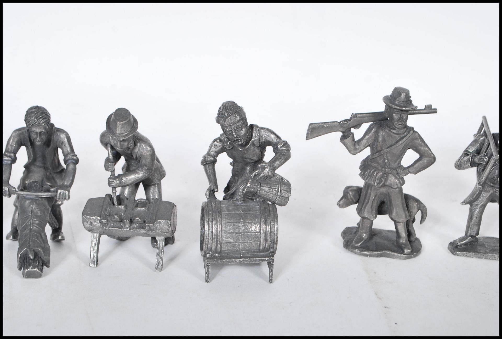 A good collection of twelve pewter figures by Daalderop Holland consisting of hunter and his dog, - Image 3 of 4