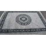 A large Persian floor carpet Keshan rug having a black ground with geometric borders and central