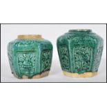 A pair of late 19th Century Chinese stoneware ginger jars of hexagonal form having panels of
