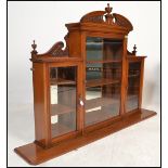 A large 19th Century chemist's apothecary wall display cabinet consisting of three mirror backed