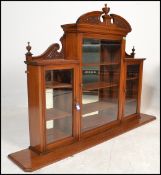 A large 19th Century chemist's apothecary wall display cabinet consisting of three mirror backed