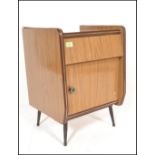 A vintage mid 20th century retro vintage wood grained formica bedside cabinet having a single