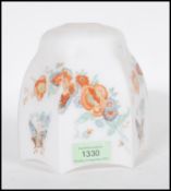 An Antique white porcelain pendant light shade with hand painted floral and butterfly