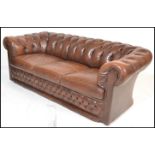 A good Victorian style chesterfield three seater sofa of good proportions, deep button back
