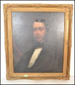 A 19th Century Victorian oil on canvas half length  portrait painting of a depicting a Victorian