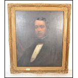 A 19th Century Victorian oil on canvas half length  portrait painting of a depicting a Victorian