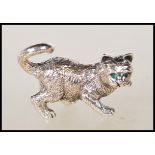 A sterling silver figure in the form of a playing cat. Stamped sterling. Gross weight 16.9g.