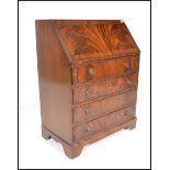 AQ 20th Century Georgian revival flame mahogany bureau fall front with appointed interior over