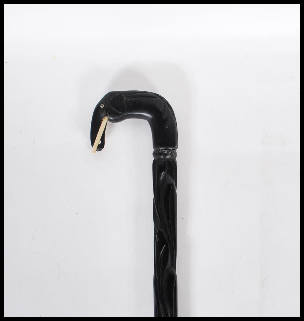 A vintage 20th Century ebony walking stick cane. The handle in the form of an elephant with carved - Image 2 of 6