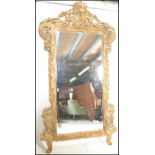 A stunning contemporary tall large carved Louis XVI style gilt framed floor standing mirror gilt