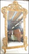 A stunning contemporary tall large carved Louis XVI style gilt framed floor standing mirror gilt