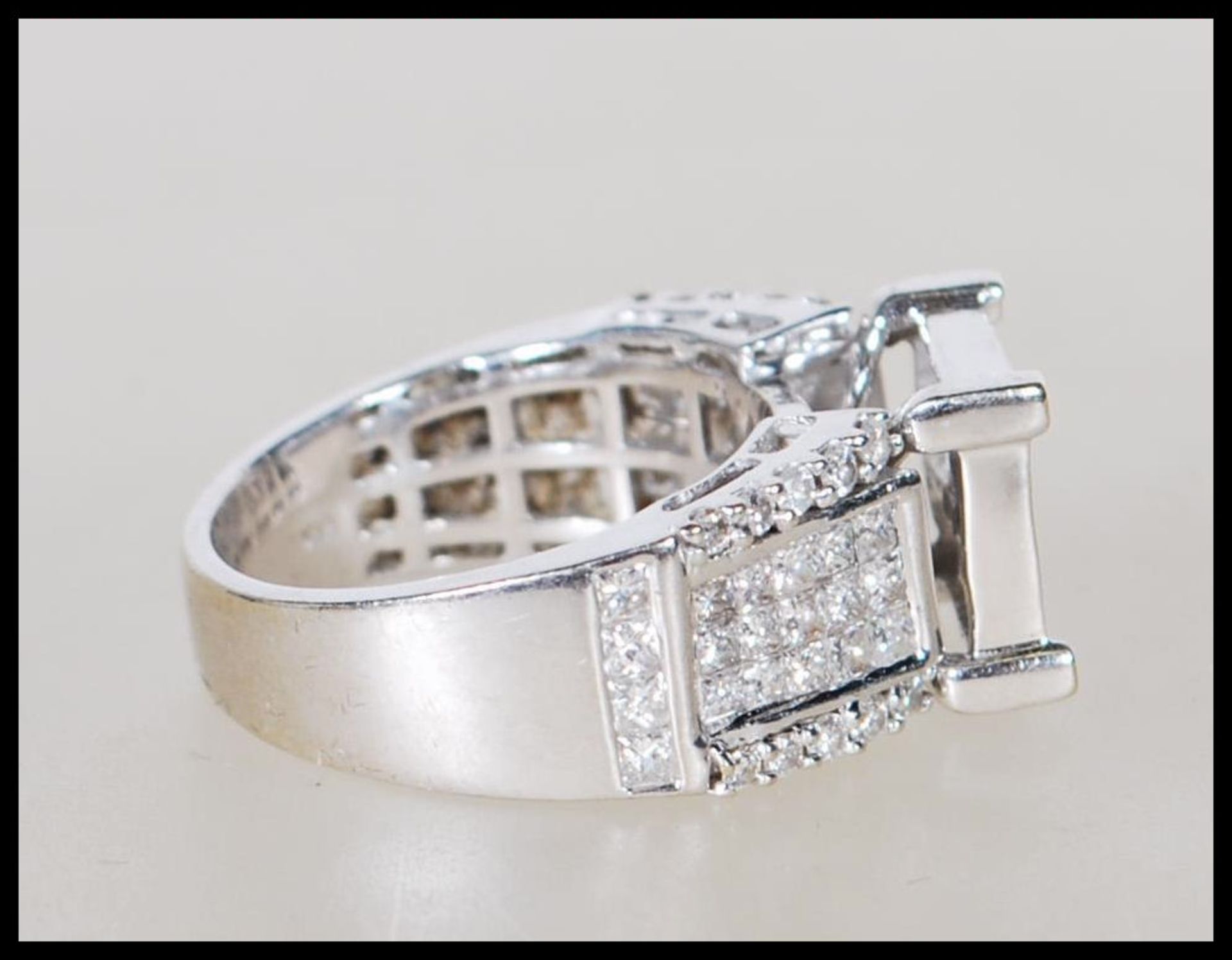 A stamped 14ct white gold and diamond ring. The head having a pave set of diamonds on a suspended - Bild 2 aus 5