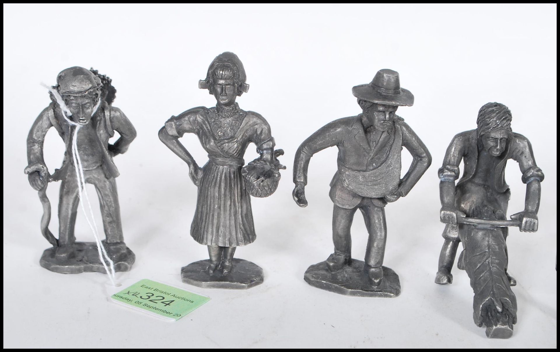 A good collection of twelve pewter figures by Daalderop Holland consisting of hunter and his dog, - Image 2 of 4