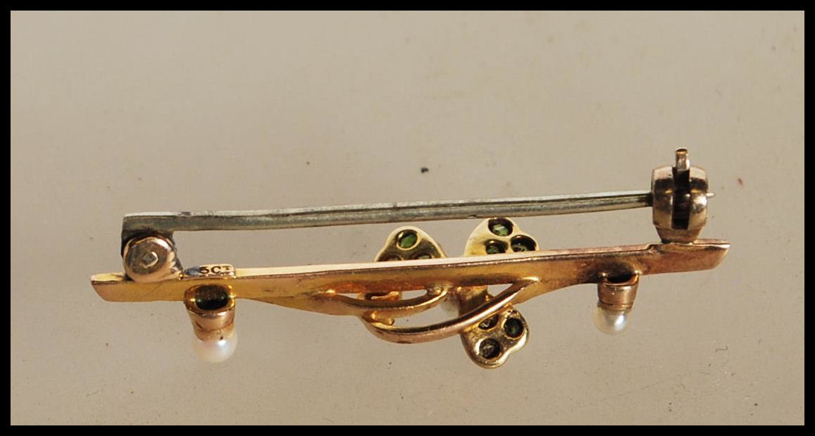 A 15ct yellow gold wirework brooch having central decoration in the form of a clover with each of - Image 3 of 3