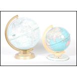 Two retro 20th Century globes one by Replogle World Scholar Series textured in relief. Together with