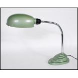 A retro mid 20th Century 1960's industrial desk / table lamp having articulated chrome gooseneck