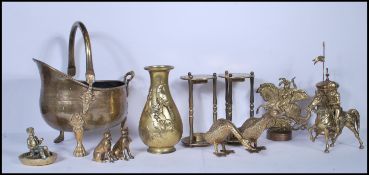 A good collection of vintage brass wares to include a Japanese baluster vase having an eagle in