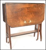 A 19th Century Victorian rosewood drop leaf inlaid folding extendable Sutherland table having railed